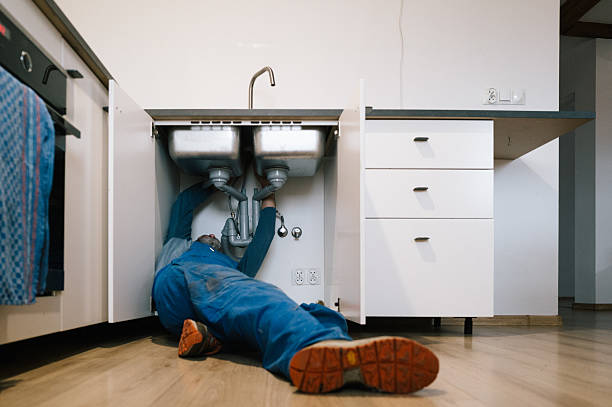 Professional Drain Cleaning technician working in Groves, TX
